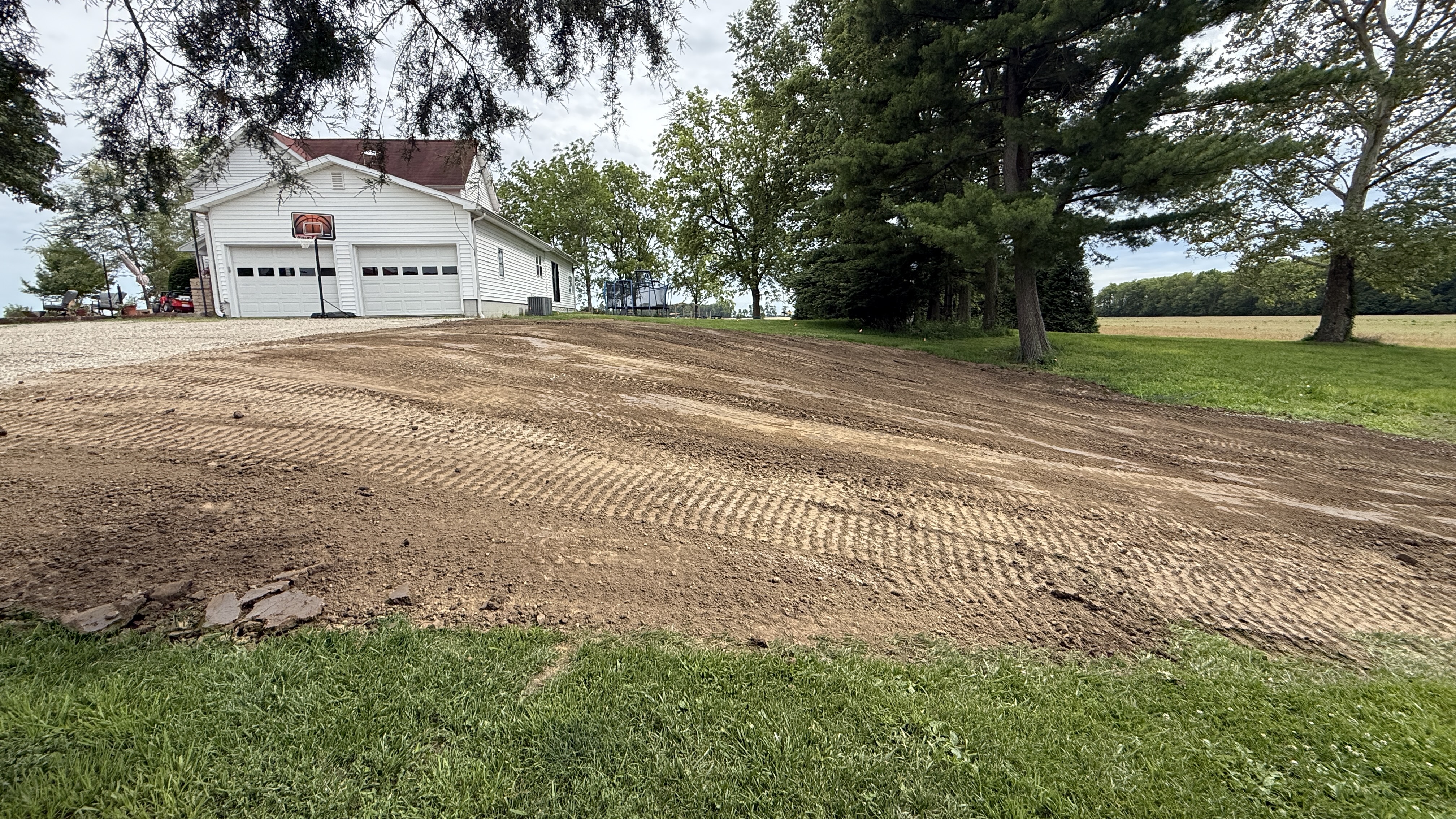 Yard Void Fill and Topsoil Grading Project after photo 2